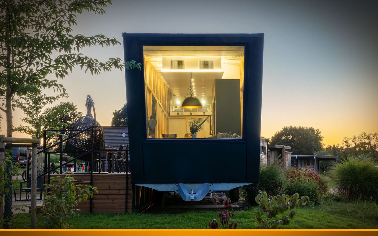 view of a beautiful tiny house on a campsite