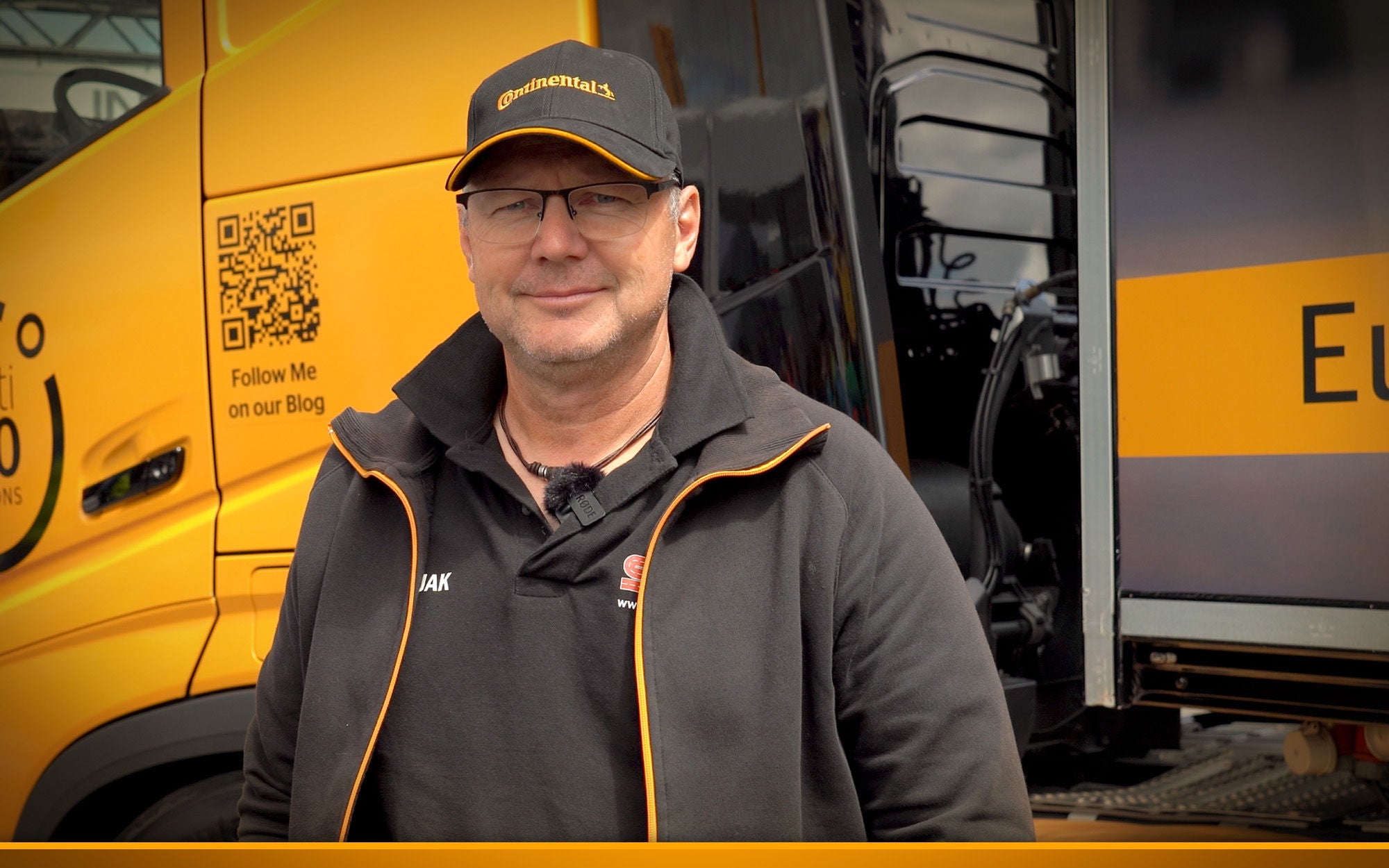 Man in front of a truck